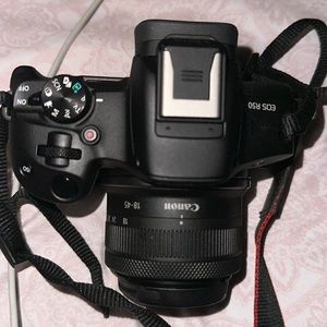 Canon E0S R50. With battery charger. RF-S 18-45mm F4.5-6.3 IS STM KIT